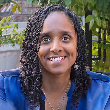 A headshot of Melanie Thomas.